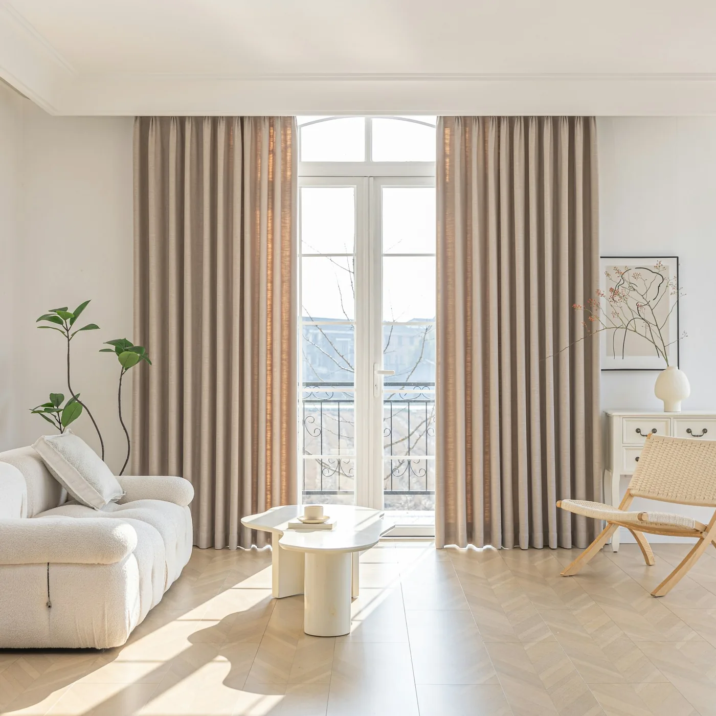 Motorised curtains running on a track across a wide window