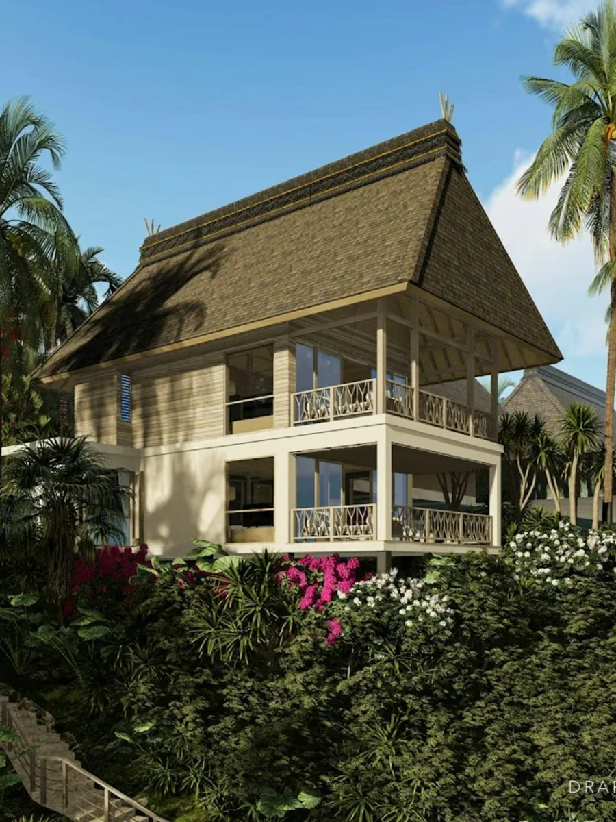 Hillside home in Goa with large windows looking out over a green valley