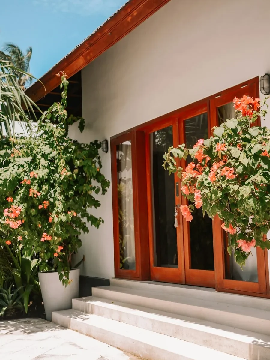 Traditional Goan village house with a red-tiled roof and a balcão at the front