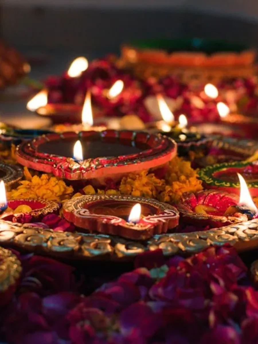 Goan home decorated with lamps for Diwali in clear post-monsoon light